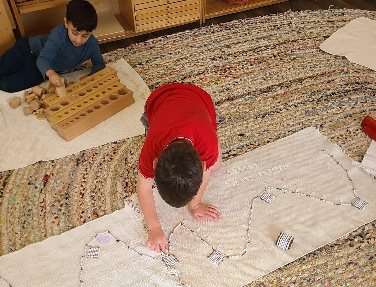 p3-floor-work-1 image Primary Montessori classroom environment