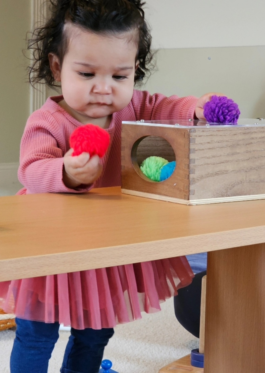 baby-experience image Baby with Montessori materials